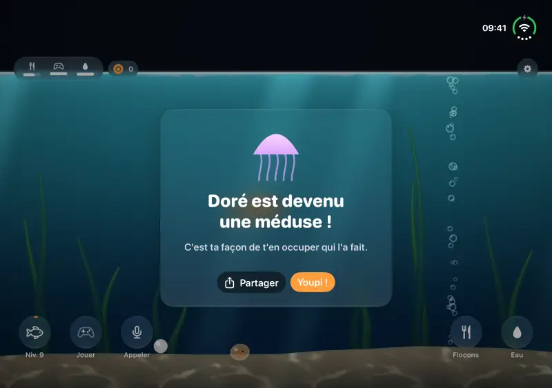 Une méduse lumineuse dans l'aquarium la nuit.